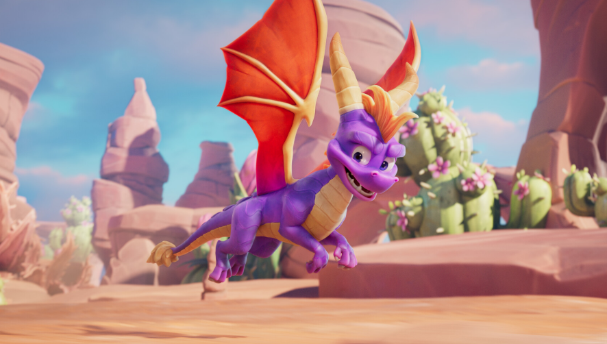 Spyro corriendo por un desierto rocoso en Spyro: A Realm Beyond