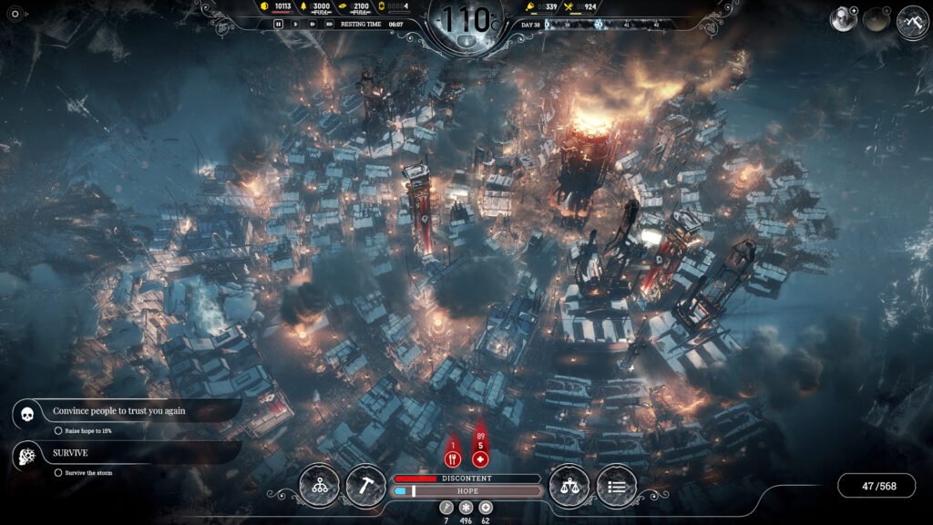 Vista aérea de una ciudad de Frostpunk iluminada de noche en mitad del hielo