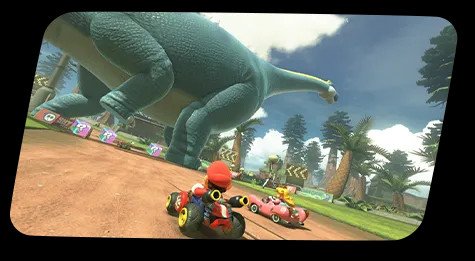 Carrera de Mario Kart World junto a un dinosaurio gigante